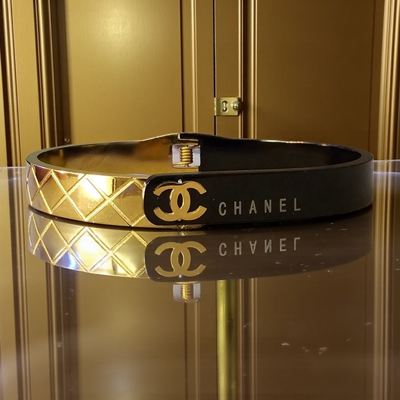 Jewelry - Black And Gold Clamper Bracelet